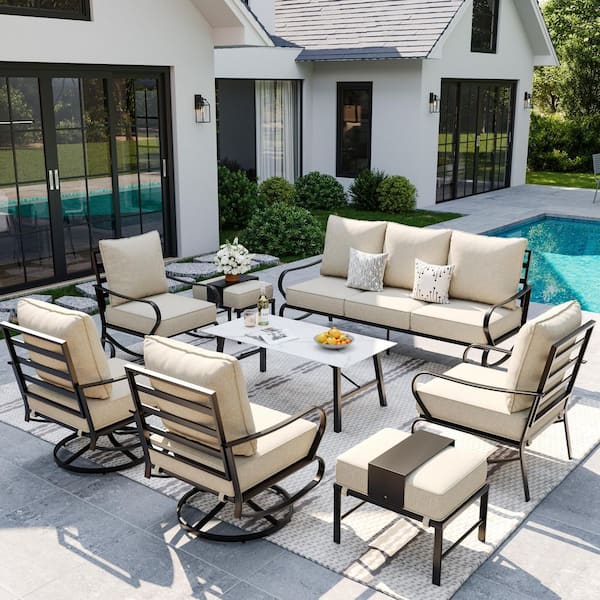 Poteban Beige 7-Person 8-Piece Iron Metal Patio Conversation Set With Beige Cushions.