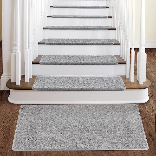 https://images.thdstatic.com/productImages/07d0961a-909a-4fef-8d83-2c3afc437b06/svn/light-gray-pure-era-stair-tread-covers-pe-st01-lgr14-4f_600.jpg