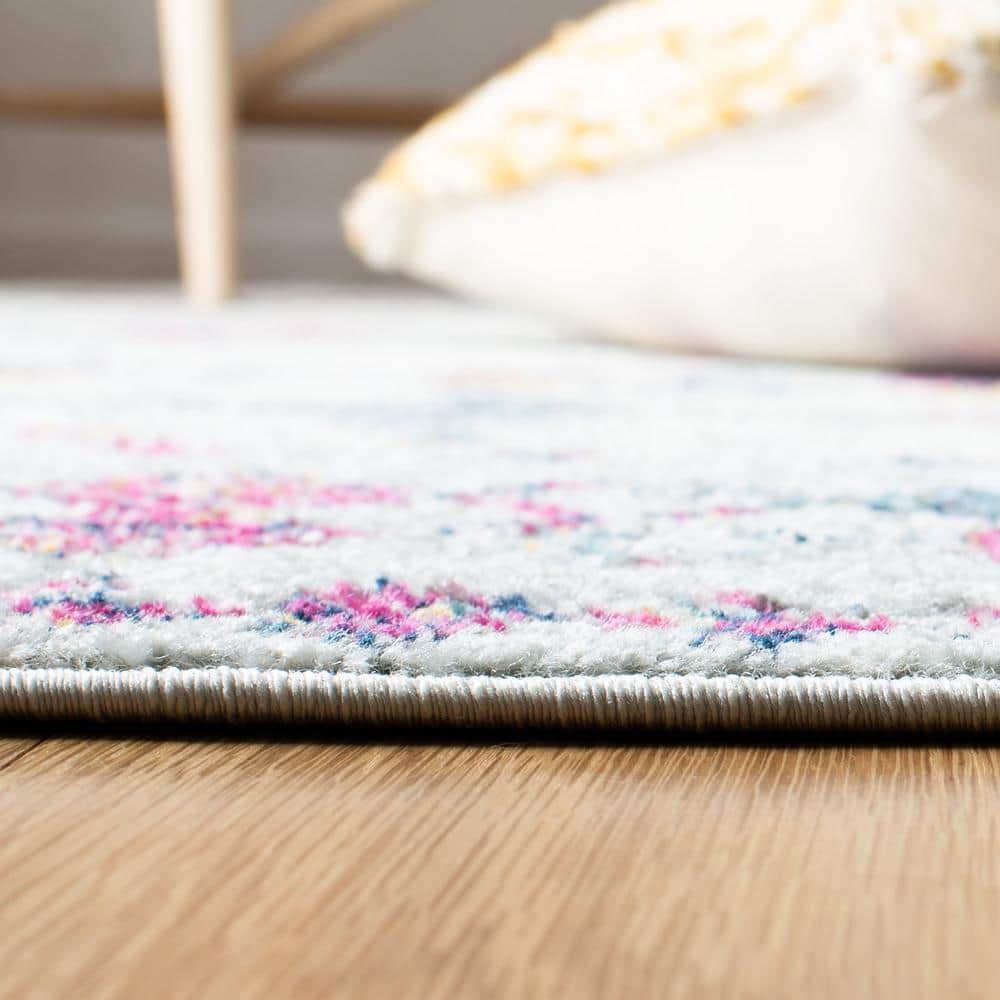 Ivory and Multicolor Geometric Wool and Synthetic 10' x 14' Area Rug