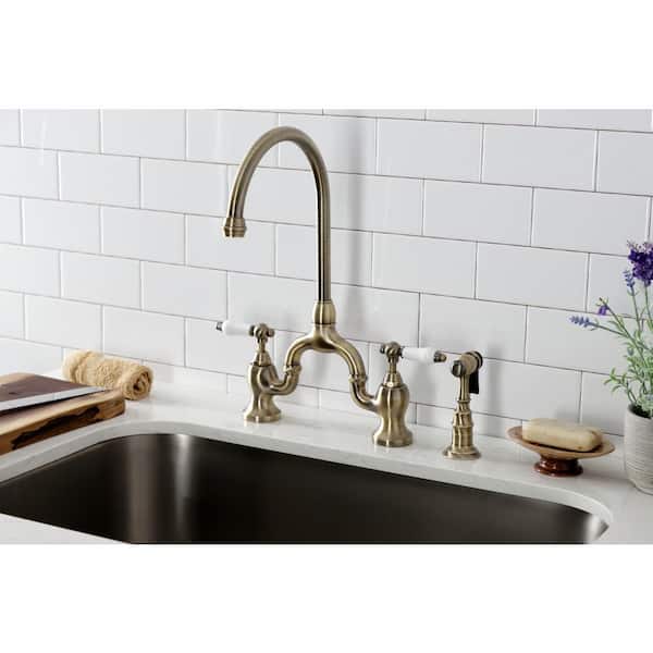 English Country Double-Handle Deck Mount Gooseneck Bridge Kitchen Faucet with Brass Sprayer in Antique Brass