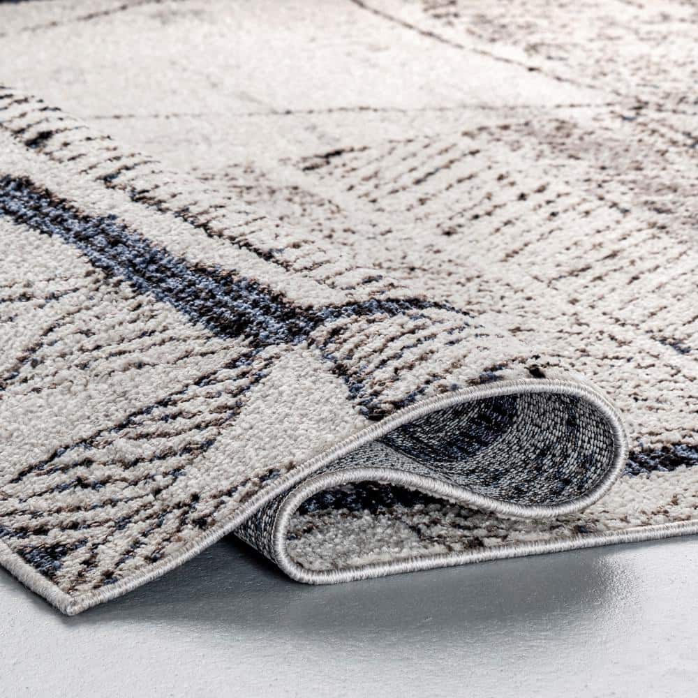 Beige 5'3" x 7'7" Moroccan-Inspired Synthetic Area Rug
