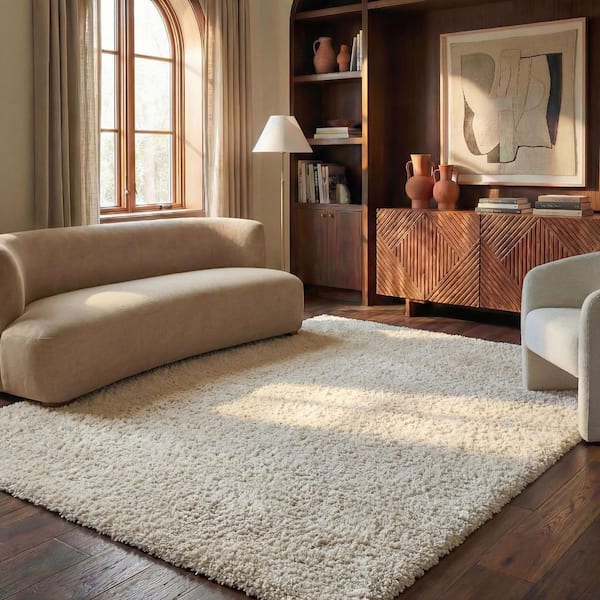 Milan Solid Shag 8 ft. x 10 ft. Ivory Living Room/Bedroom Area Rug