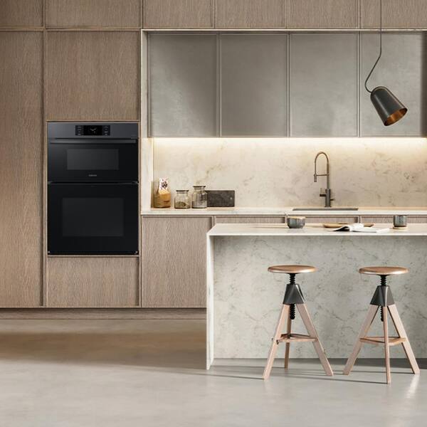 https://images.thdstatic.com/productImages/0817c976-7ce2-4318-9db5-973c2f72f202/svn/black-matte-steel-samsung-wall-oven-microwave-combinations-nq70cg700dmt-77_600.jpg