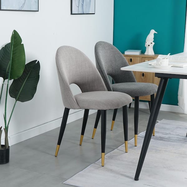 beige dining chairs with black legs