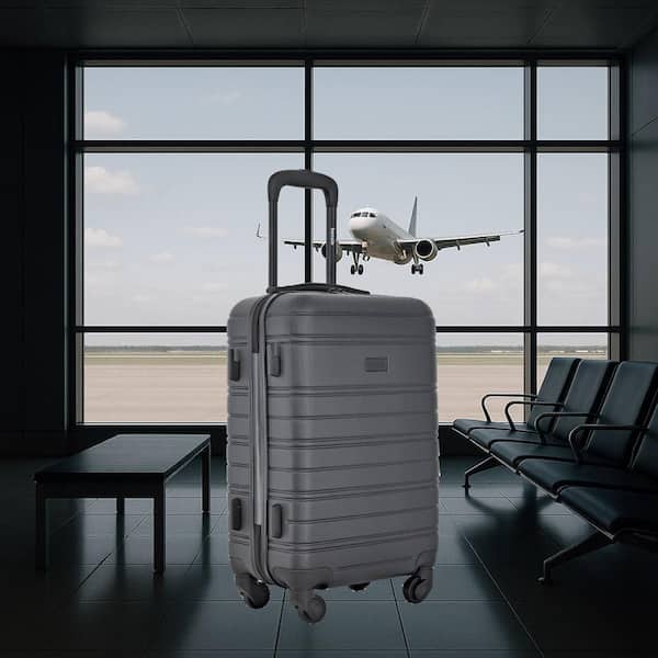 Kensie 20 in. Black Rolling Hard Case Carry-On with Luggage Tag KN