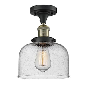 Bell 8 in. 1-Light Black Antique Brass Semi-Flush Mount with Seedy Glass Shade