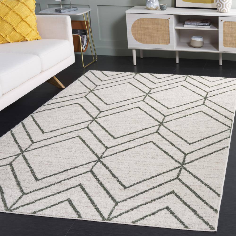 Ivory and Dark Green Geometric Synthetic Area Rug
