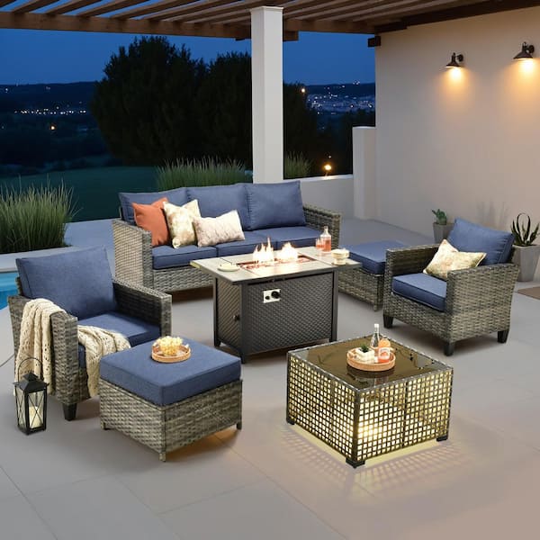 Nvelyn Gray 7-Piece Wicker Patio Fire Pit Table Conversation Set with Denim Blue Cushions and Coffee Table