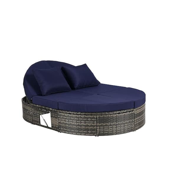 2 Person Composite Outdoor Day Bed with Dark Blue Cushions and Pillows
