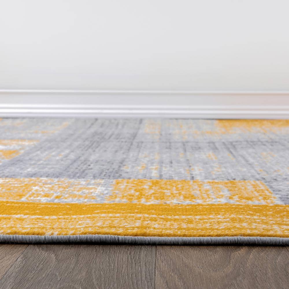 Yellow and Gray Geometric Distressed Area Rug 5' x 7'