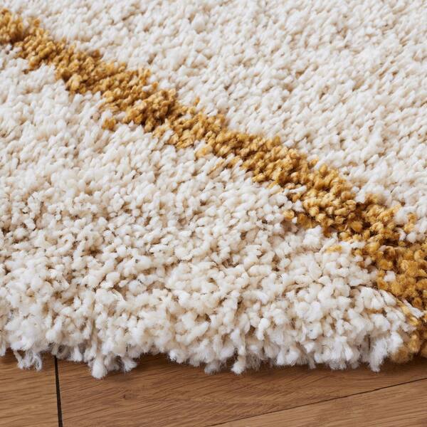 SAFAVIEH Hudson 7 ft. x 7 ft. Ivory/Gold Geometric Round Rug