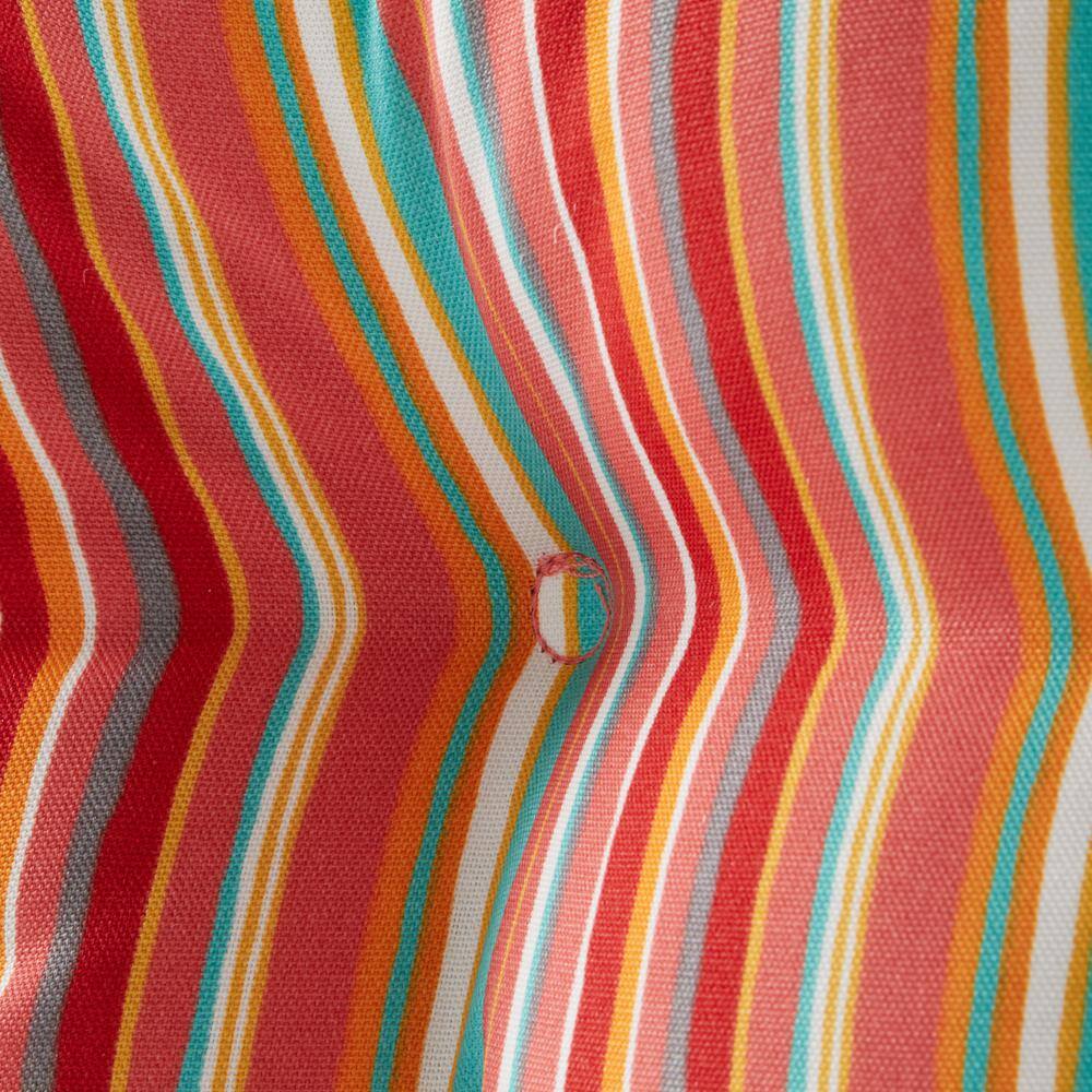Close-up of the striped texture on the cushion fabric.