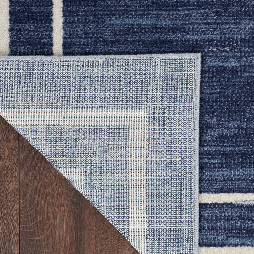 Navy and Ivory 10' x 14' Synthetic Rectangular Rug