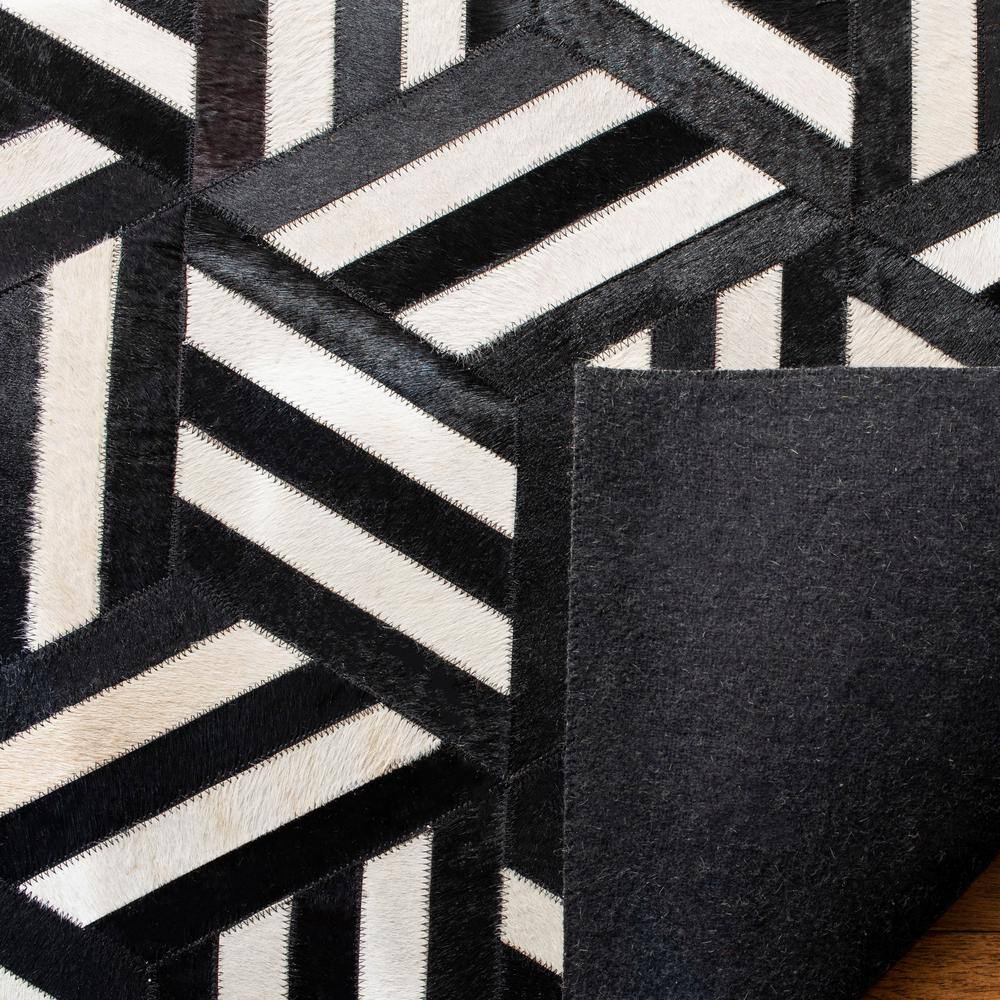 Ivory and Black Geometric Cowhide Area Rug, 8' x 10'