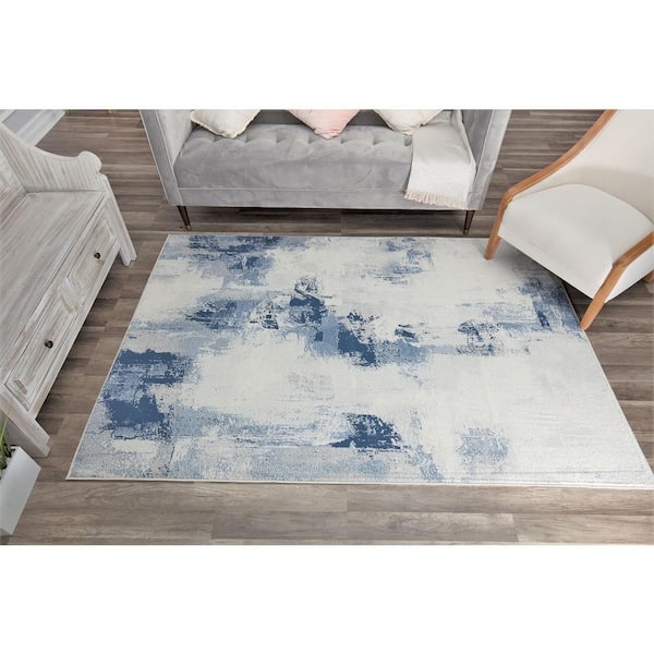 https://images.thdstatic.com/productImages/085d4796-fe1b-4b4e-8a3f-05838729b6e5/svn/tonal-blue-rugs-america-area-rugs-ra28998-31_600.jpg