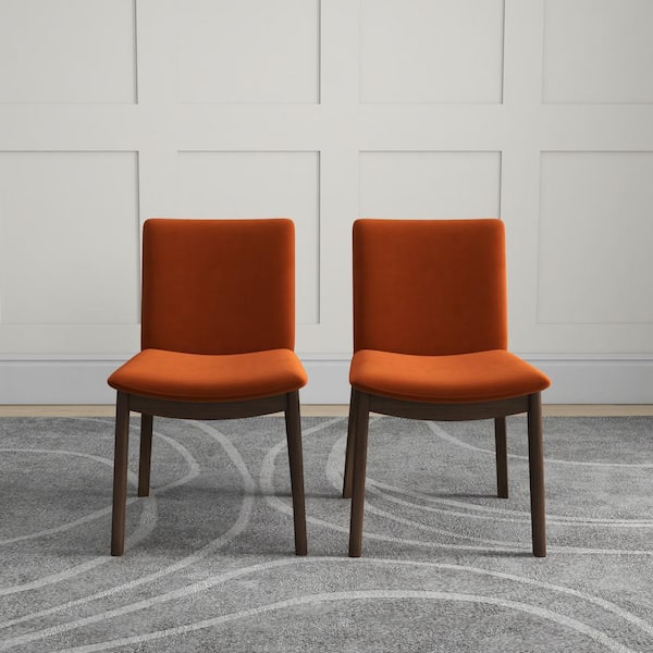 https://images.thdstatic.com/productImages/0867f88f-d4b4-4417-b8a9-e493c4d813bc/svn/orange-ashcroft-furniture-co-dining-chairs-dchr-vir-vel-org-44_600.jpg