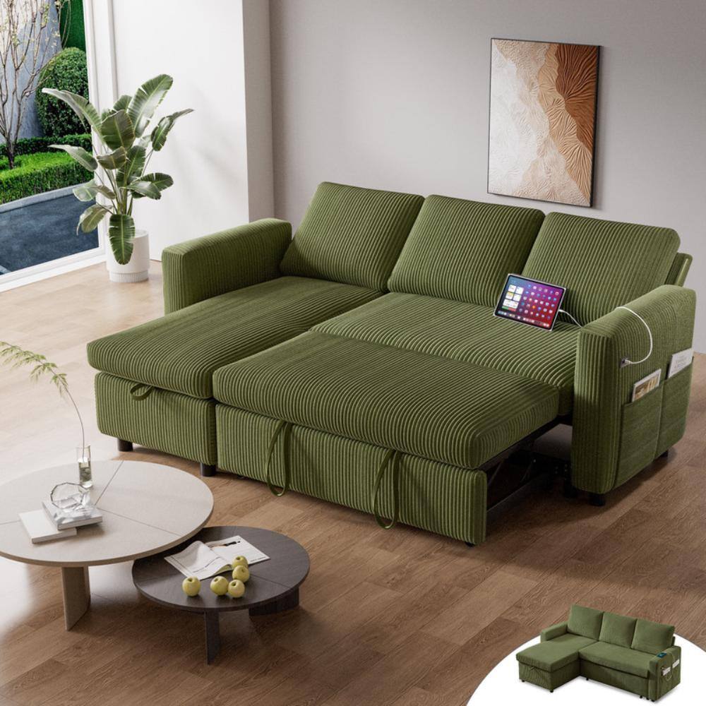 L-shaped green corduroy sleeper sofa bed with pull-out section.