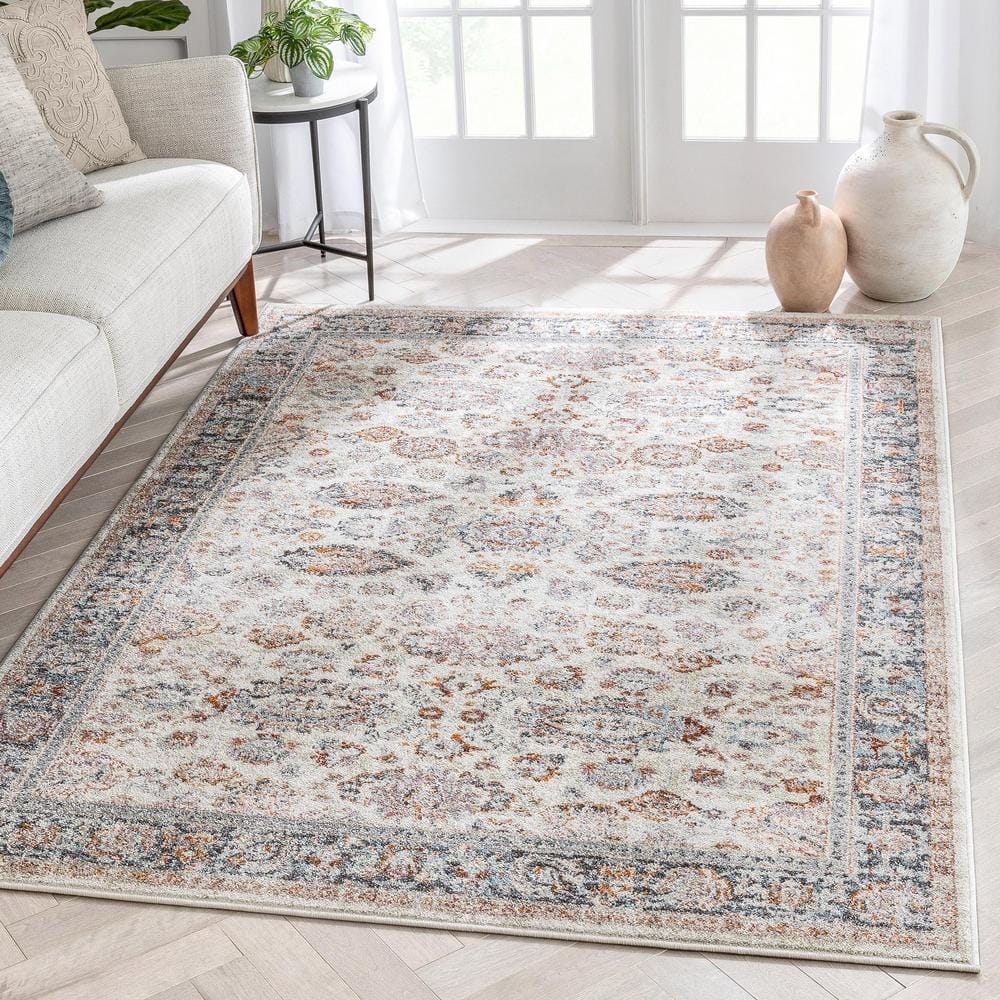 Ivory Floral Synthetic Reversible 5' x 7' Area Rug