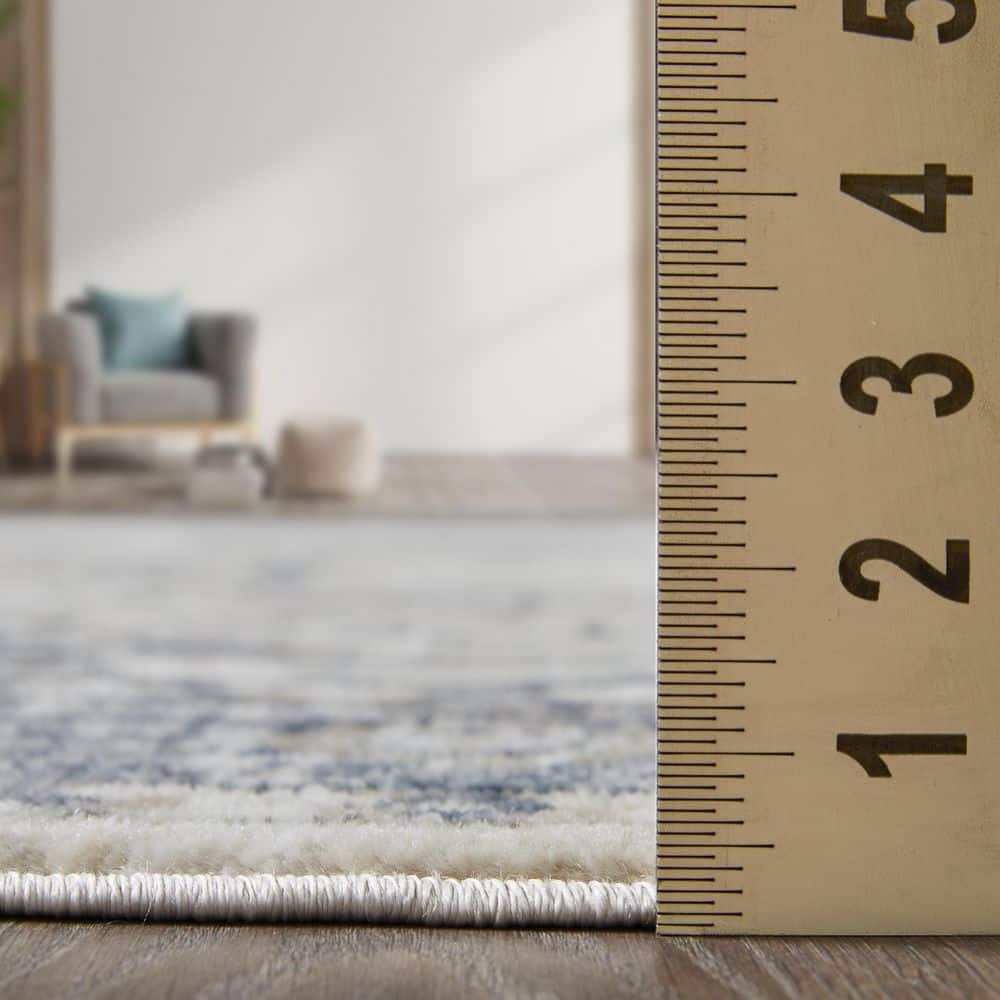 Blue and Beige Floral Medium Pile Synthetic Area Rug
