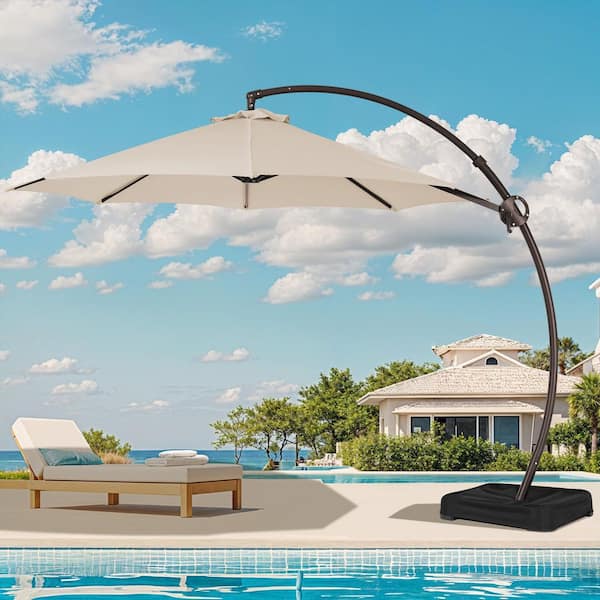 JEAREY 11 ft. L Outdoor Aluminum Curvy Cantilever Offset Hanging Patio Umbrella with Sandbag Base and Cover in Beige