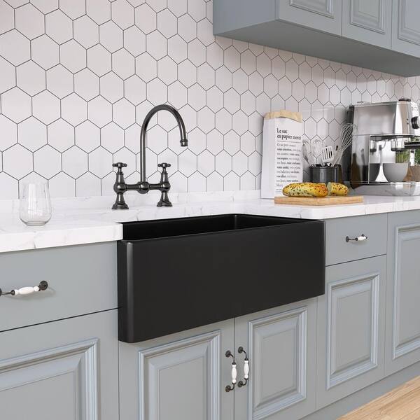 https://images.thdstatic.com/productImages/08e1edae-67d1-4503-aee0-f89112e1aa88/svn/matte-black-zeafive-farmhouse-kitchen-sinks-zfc3618-b1-c3_600.jpg