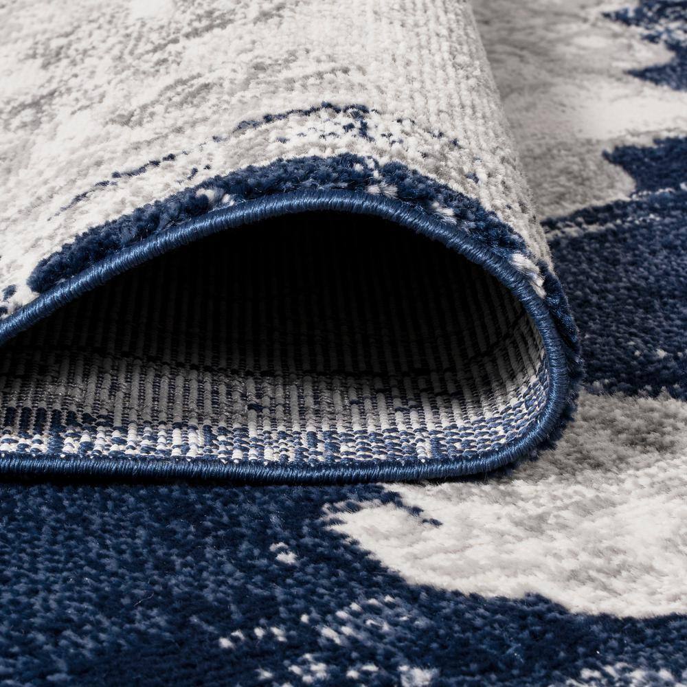 Ivory and Navy Synthetic Reversible Medallion Area Rug