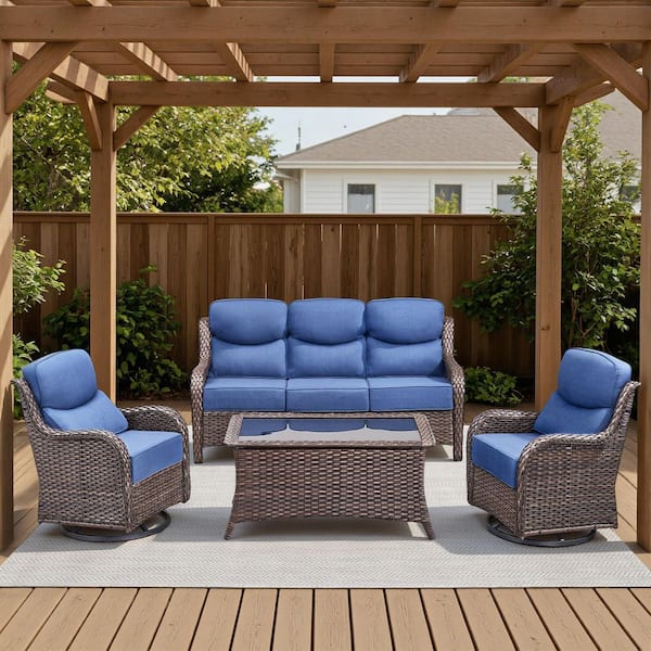 Arcadia Brown 4-Piece Wicker Patio Conversation Set with Swivel Gliders and 6 in. Thick Olefin Navy Blue Cushions