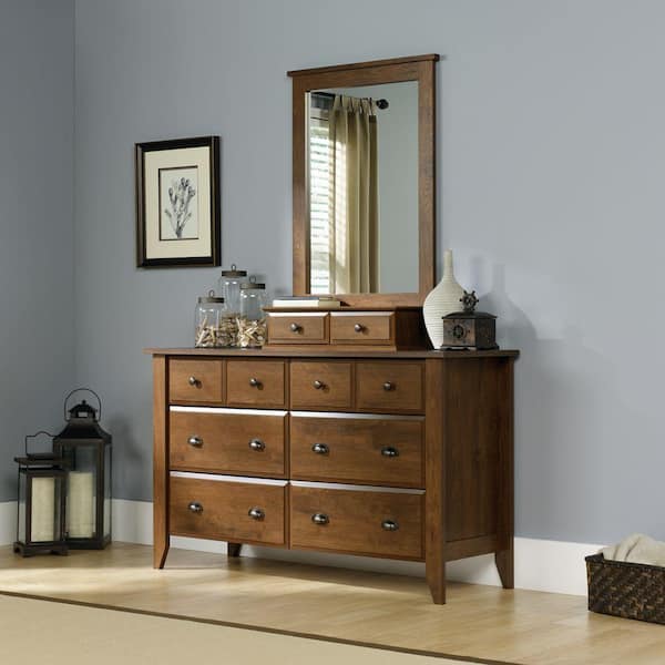 SAUDER Shoal Creek Collection 42.3 in H x 27.4 in. W Oiled Oak Framed Mirror with Storage Drawers