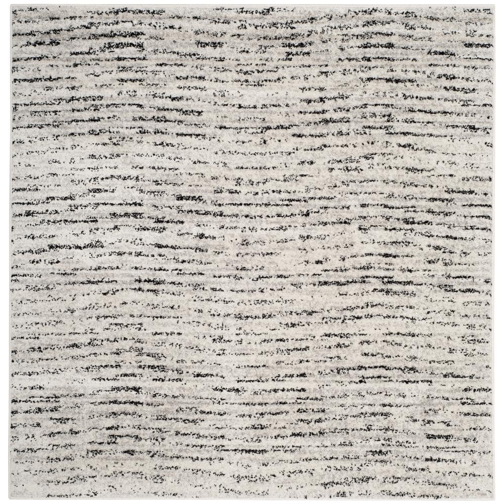 Ivory and Silver Synthetic Rectangle Area Rug, 10' x 14'