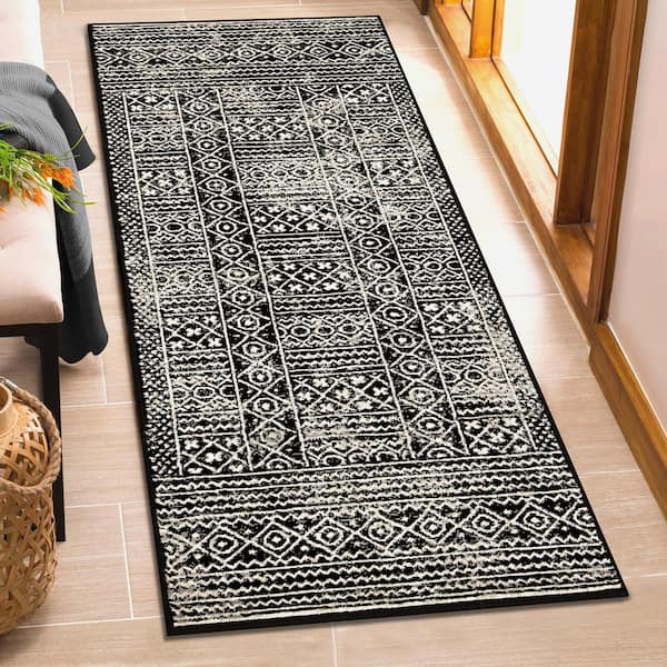 Navajo Black 2 ft. 6 in. x 10 ft. Floral Geometric Border Indoor Runner Rug