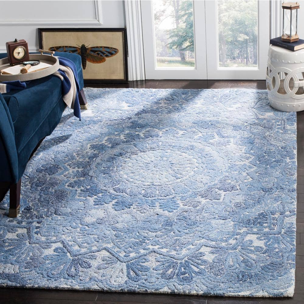 Hand-Tufted Elegance Blue/Ivory Wool 9' x 12' Rug