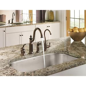 Waterhill High-Arc Single-Handle Standard Kitchen Faucet with Side Sprayer in Oil Rubbed Bronze