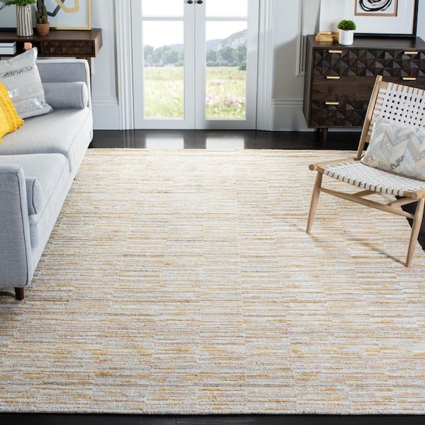 Elements 9 ft. x 12 ft. Gold Striped Marle Area Rug