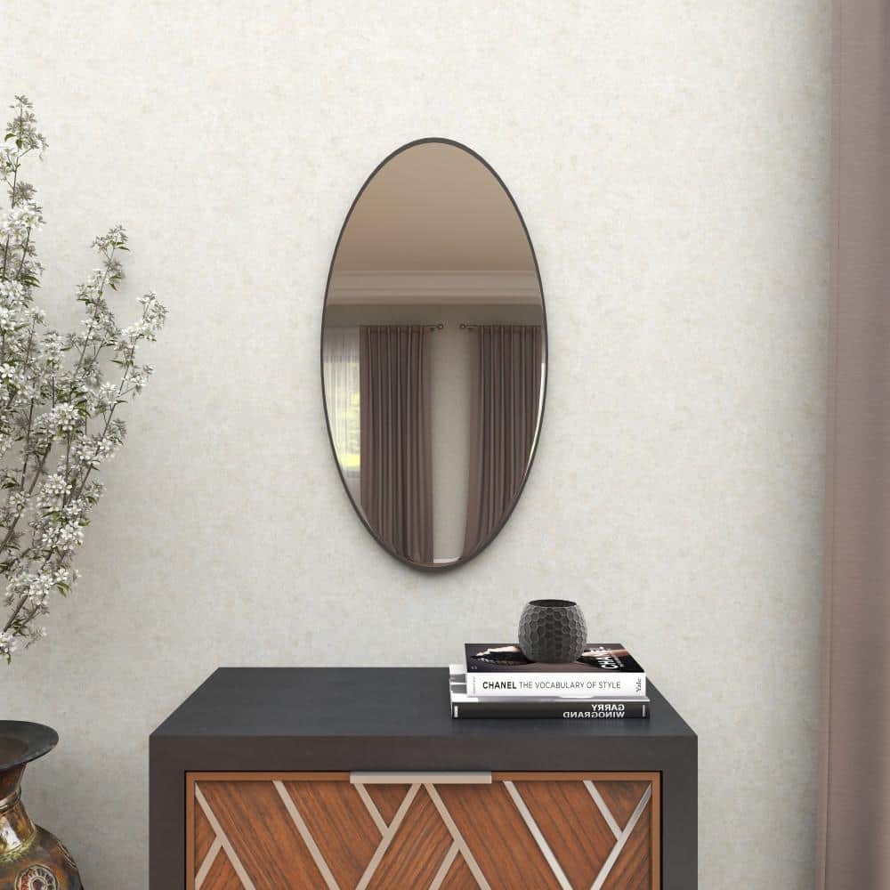 Litton Lane 31 in. x 18 in. Oval Shaped Round Framed Black Wall Mirror ...