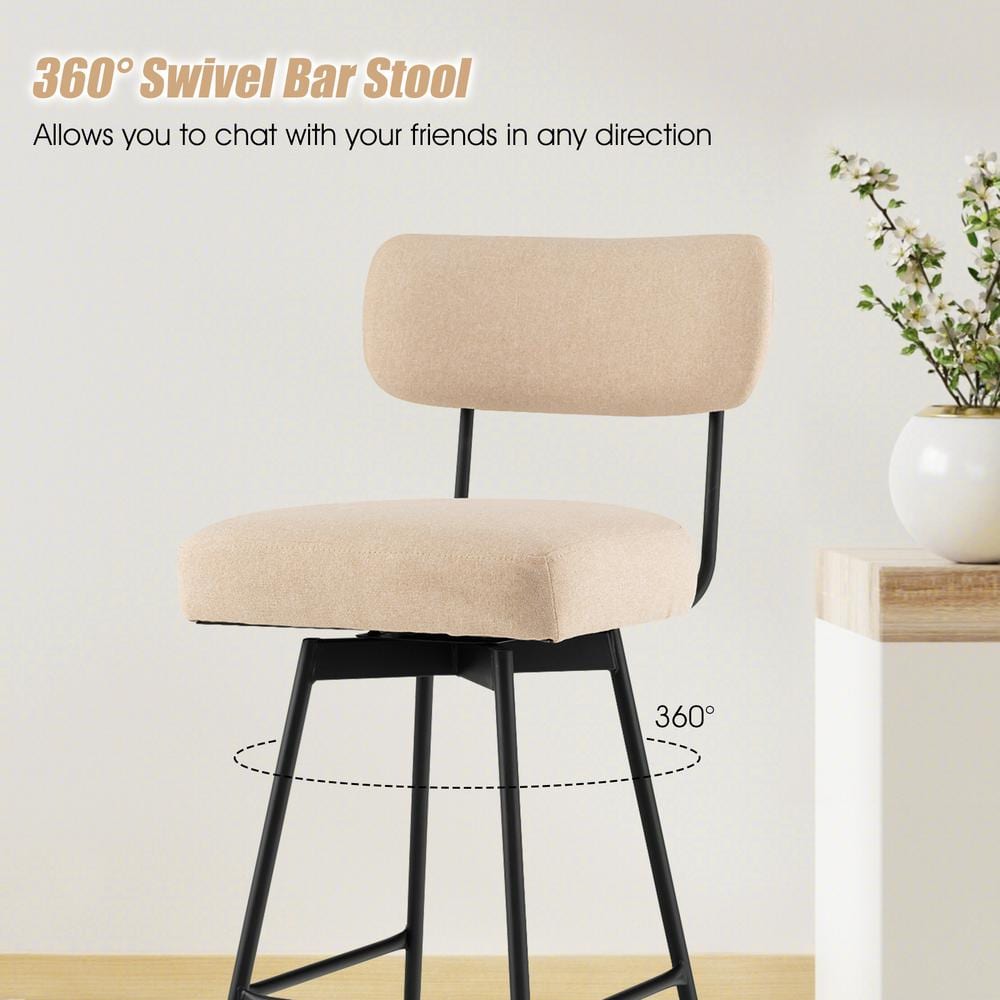 A beige upholstered bar stool demonstrating its 360-degree swivel capability.