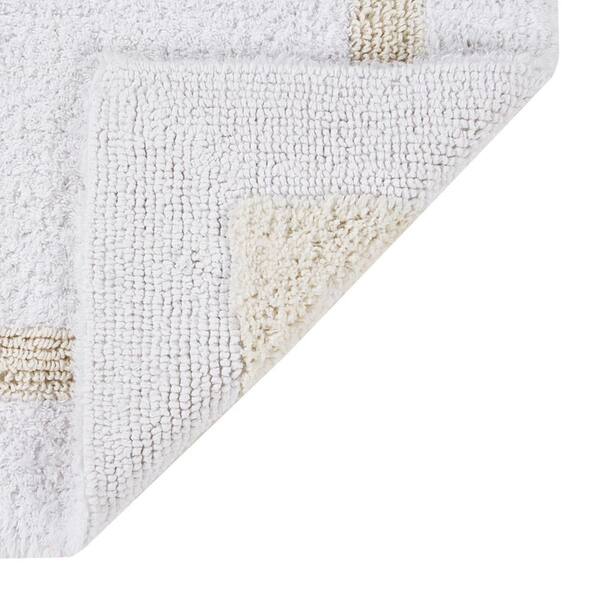 https://images.thdstatic.com/productImages/0976e0e6-c001-4150-895c-a93f16ddccd6/svn/white-ivory-better-trends-bathroom-rugs-bath-mats-baho2060whiv-c3_600.jpg