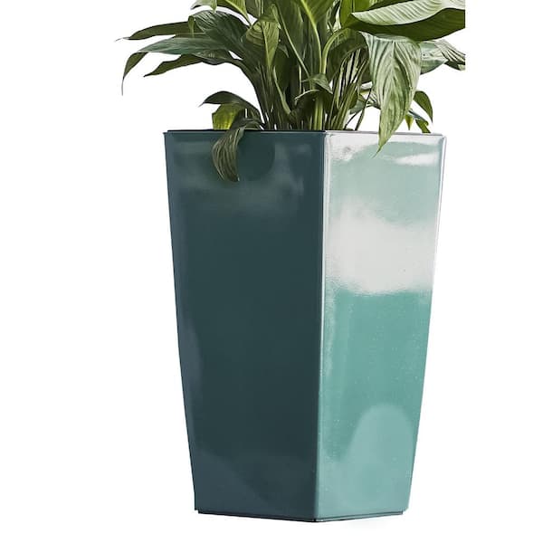 https://images.thdstatic.com/productImages/0976f117-c7cb-408e-aa54-ac9d8ccd809d/svn/turquoise-xbrand-plant-pots-swplantertr59-64_600.jpg