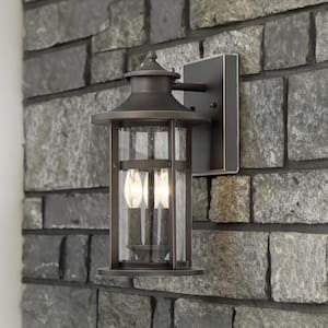Highland Ridge Collection 3-Light Oil Rubbed Bronze with Gold Highlights Outdoor Wall Lantern Sconce