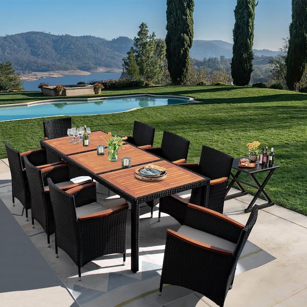 Tozey 9-Piece Acacia and Wicker Outdoor Dining Set with Beige Cushions