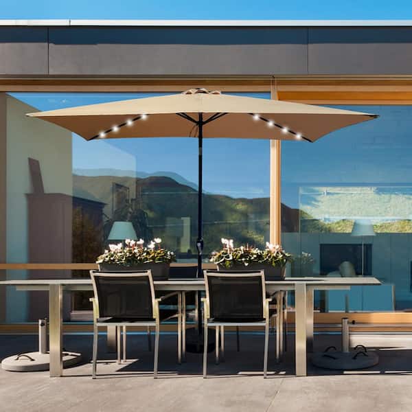 moda furnishings 10 ft. x 6.5 ft. Rectangular Market Outdoor Patio Umbrella with Crank Weather Resistant UV Protection in Tan