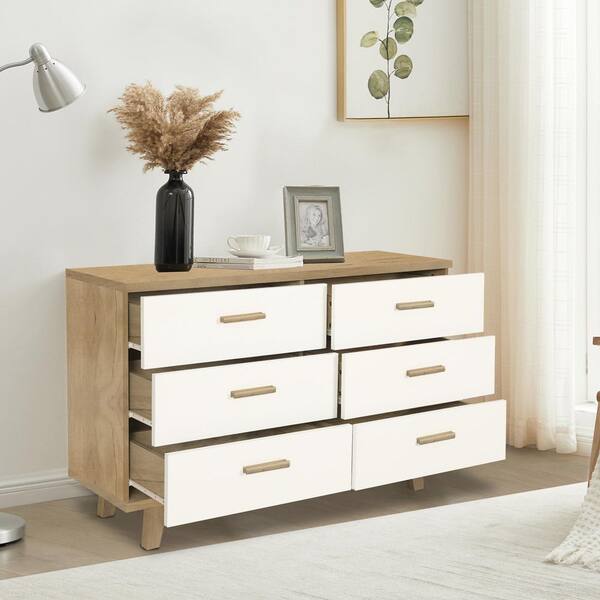 https://images.thdstatic.com/productImages/09b4c9af-4998-44b3-a10a-3df35c0d6168/svn/white-seafuloy-chest-of-drawers-c-w679s00006-e1_600.jpg