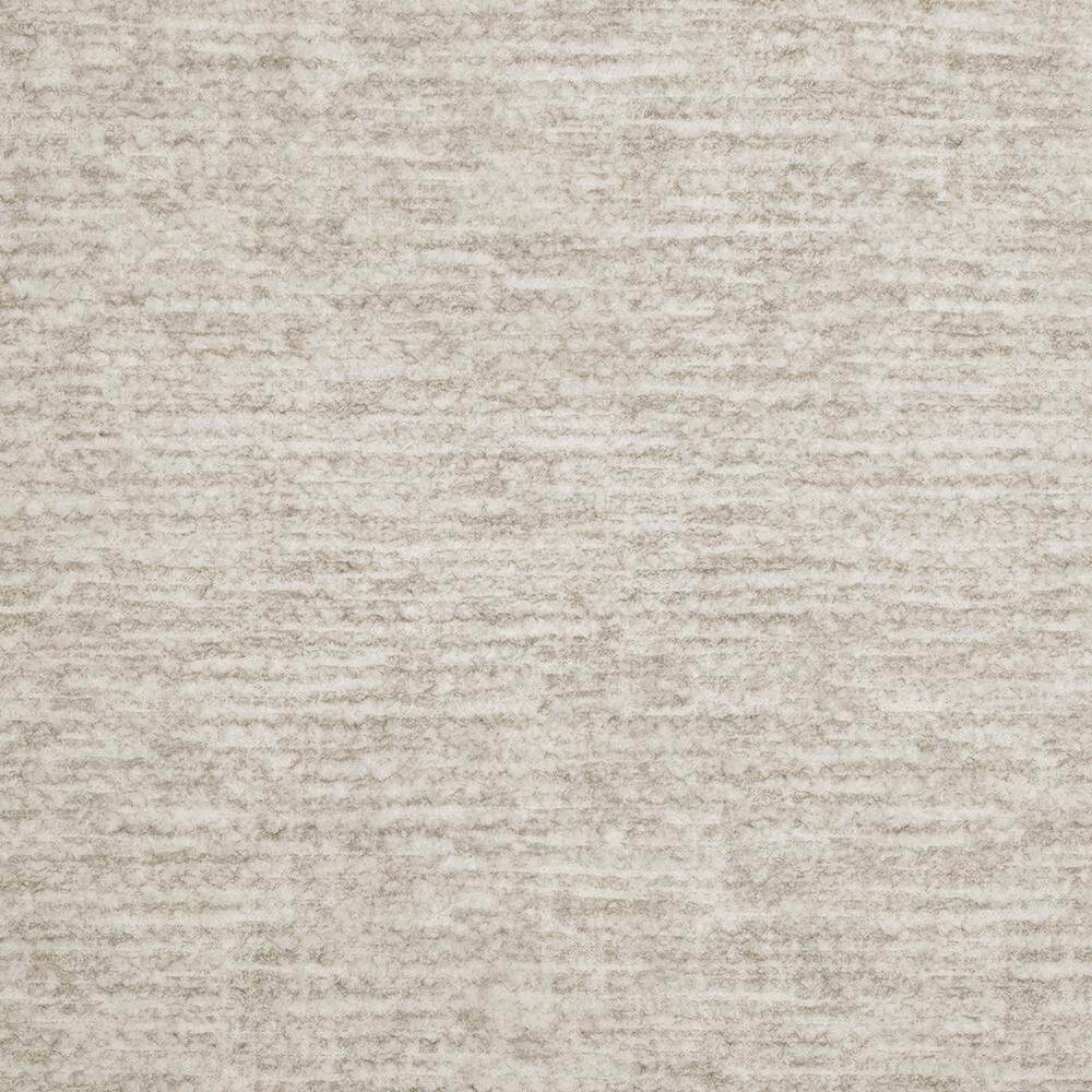 Swatch of beige microfiber upholstery fabric.