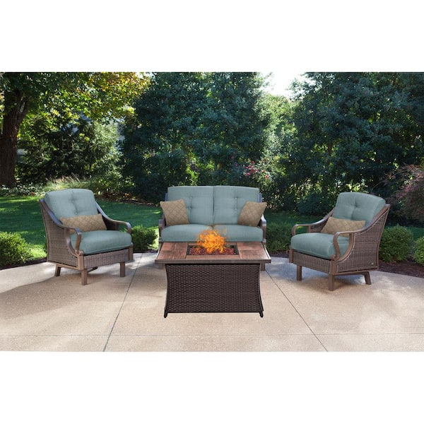 Hanover Ventura 4-Piece All-Weather Wicker Patio Conversation Set with Wood Grain-Top Fire Pit with Ocean Blue Cushions