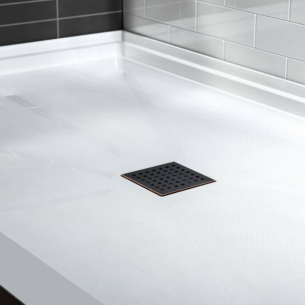60" x 36" White Solid Surface Rectangular Shower Pan Base with Oil-Rubbed Bronze Drain Cover