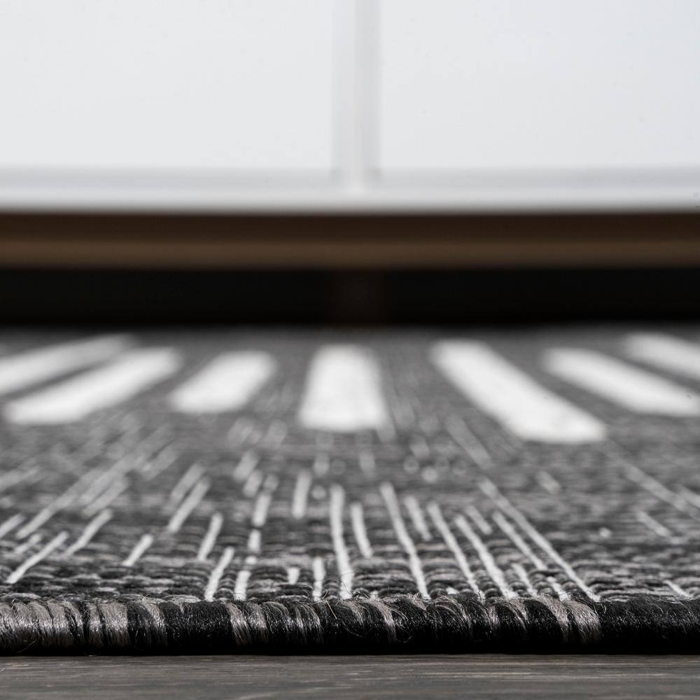 Zolak 4' x 6' Black and Ivory Synthetic Stripe Rug