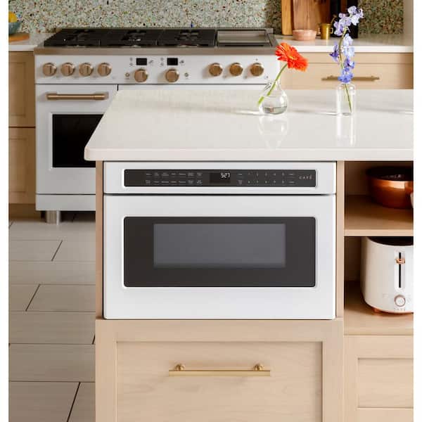 https://images.thdstatic.com/productImages/09dc59f5-c747-4365-8684-bf2e5be5a4c0/svn/matte-black-cafe-microwave-drawers-cwl112p3rd5-31_600.jpg
