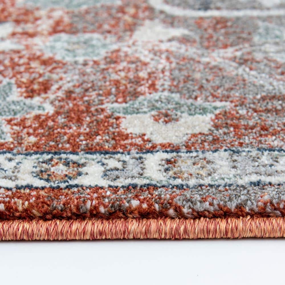 Blue and Taupe 2' x 3' Oriental Synthetic Area Rug