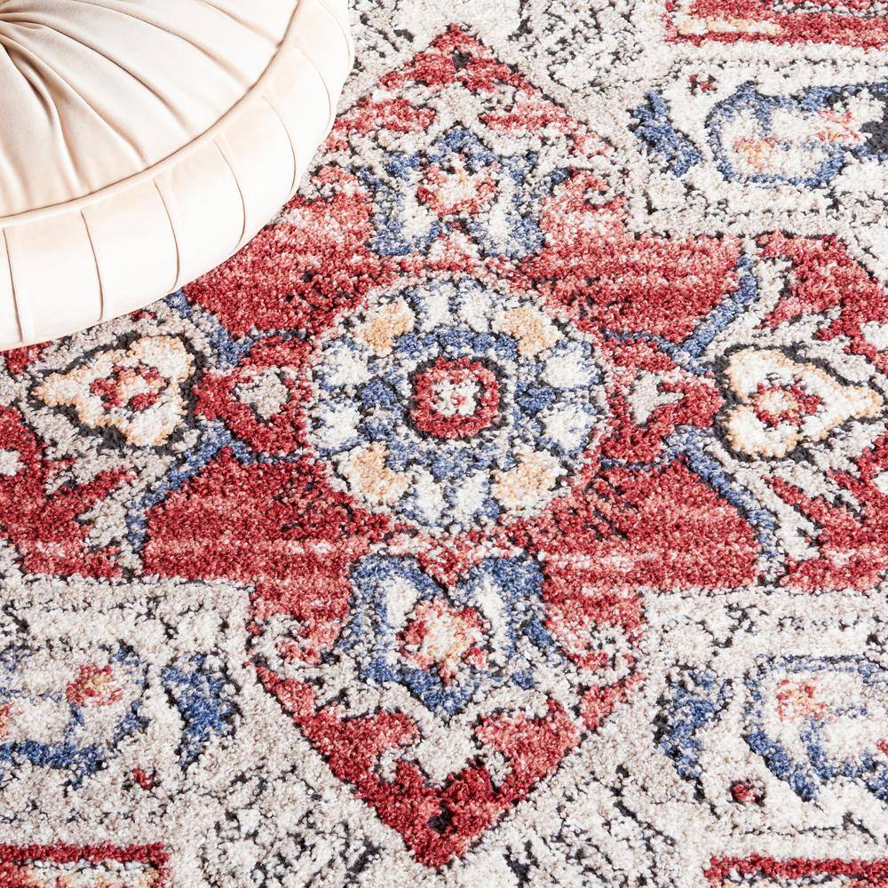 Luna 4'5" x 6'5" Blue and Rust Synthetic Area Rug
