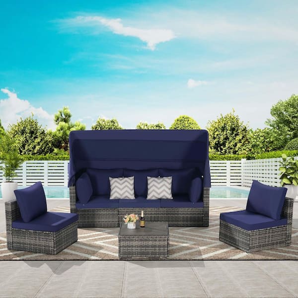 Zeus & Ruta 5-Piece Gray Wicker Outdoor Day Bed with Dark Blue Cushions, Retractable Canopy, Storable Side Table