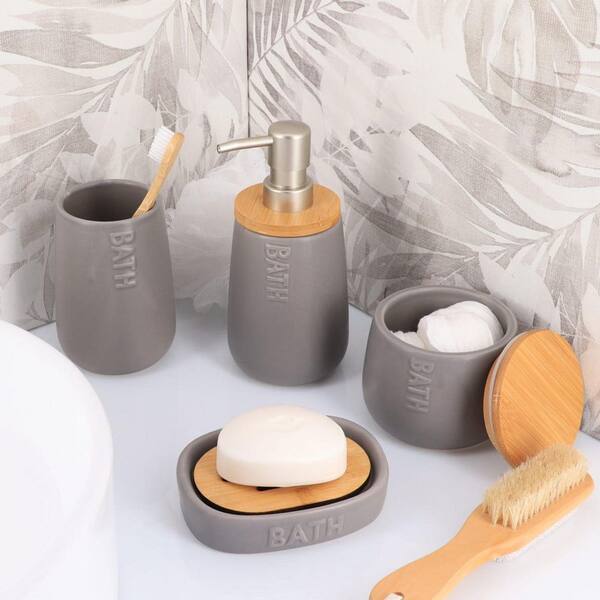 https://images.thdstatic.com/productImages/0a1834c3-e1c3-48af-ba03-6d7135e18154/svn/grey-bamboo-bathroom-accessory-sets-set5bathd6193180gray-c3_600.jpg